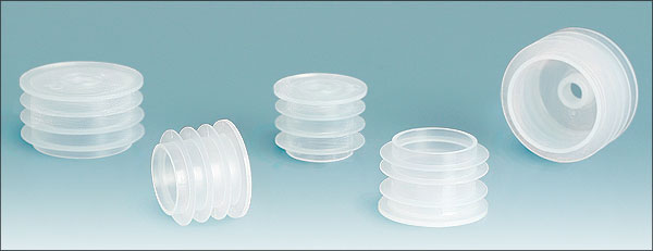 An assortment of clear plastic bottle dropper plugs in various sizes displayed against a light blue background.